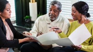 A couple in their 60s works with their financial professional to establish their estate plan.