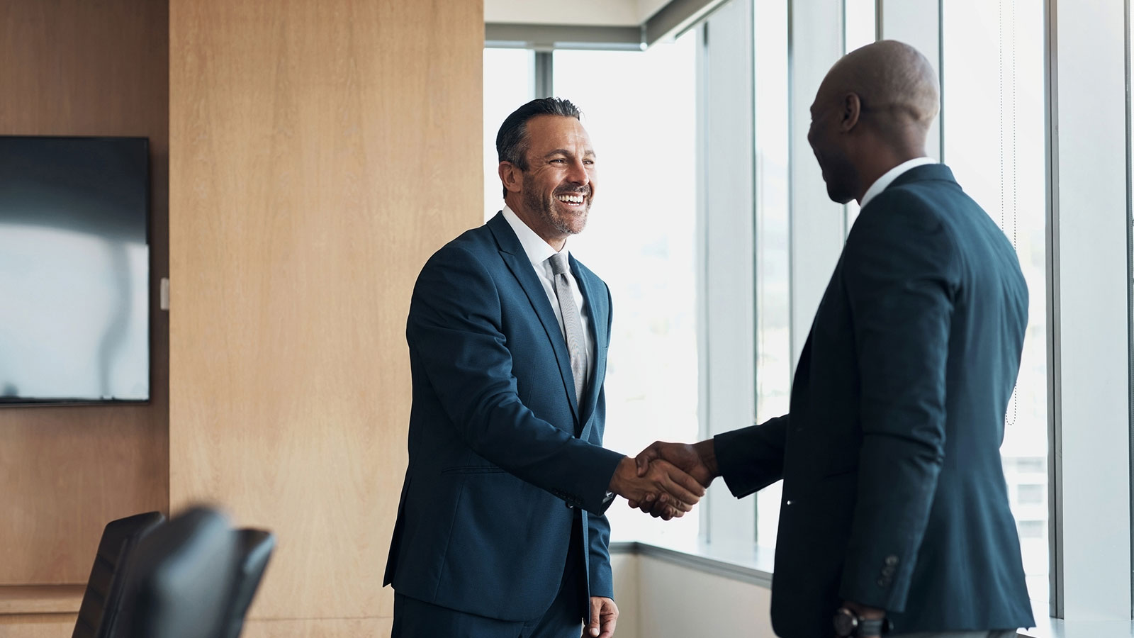 A financial professional meets with an executive at a financial services company to discuss why mutuality matters as he considers his next career step.